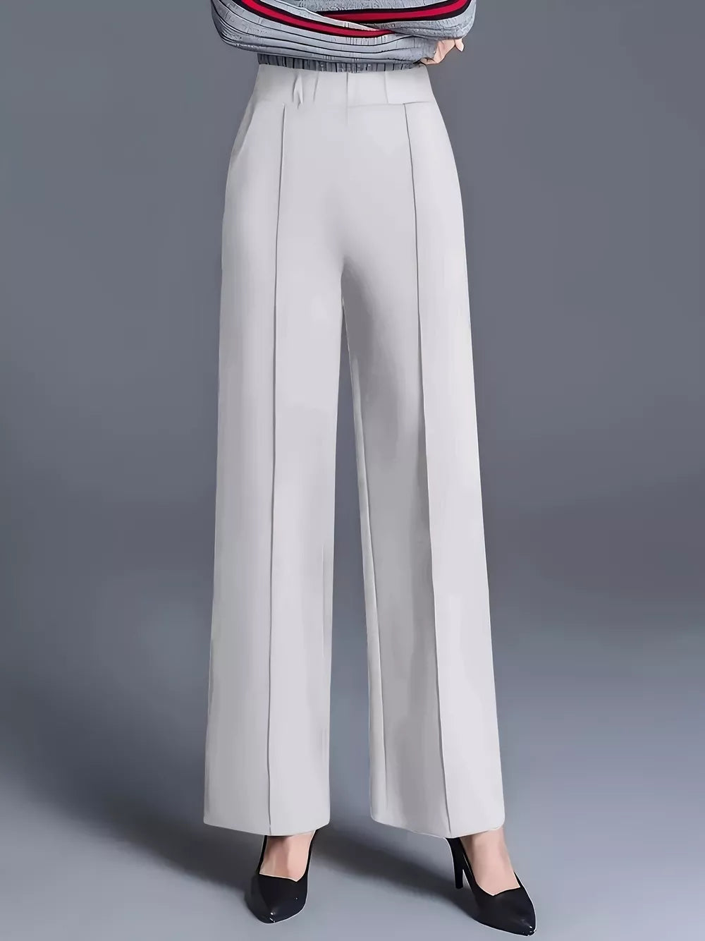 wide-leg pants in light gray featuring pocketed and flared fit