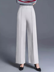 wide-leg pants in light gray featuring pocketed and flared fit