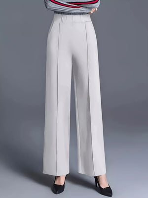 wide-leg pants in light gray featuring pocketed and flared fit
