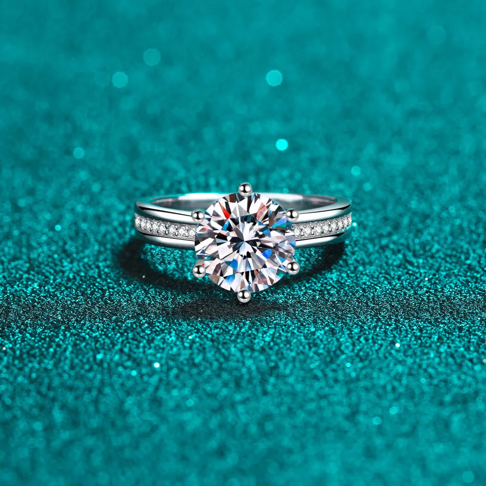 Sterling silver ring with 3-carat moissanite solitaire and pavé band