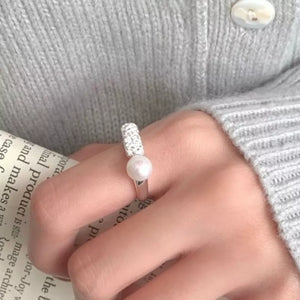 ring in Silver with textured and open design