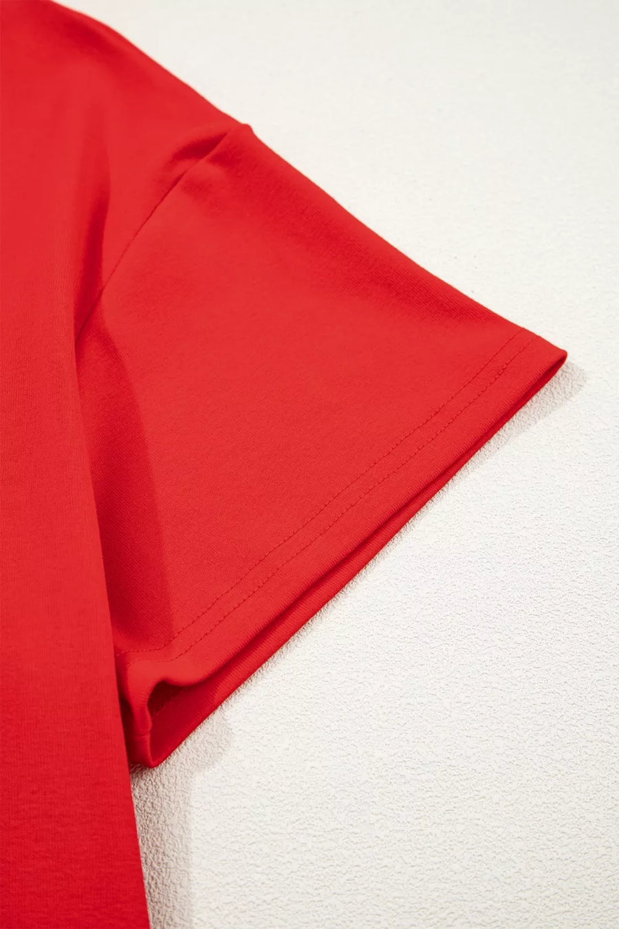 Red cotton mini dress with short sleeves and a crew neck.