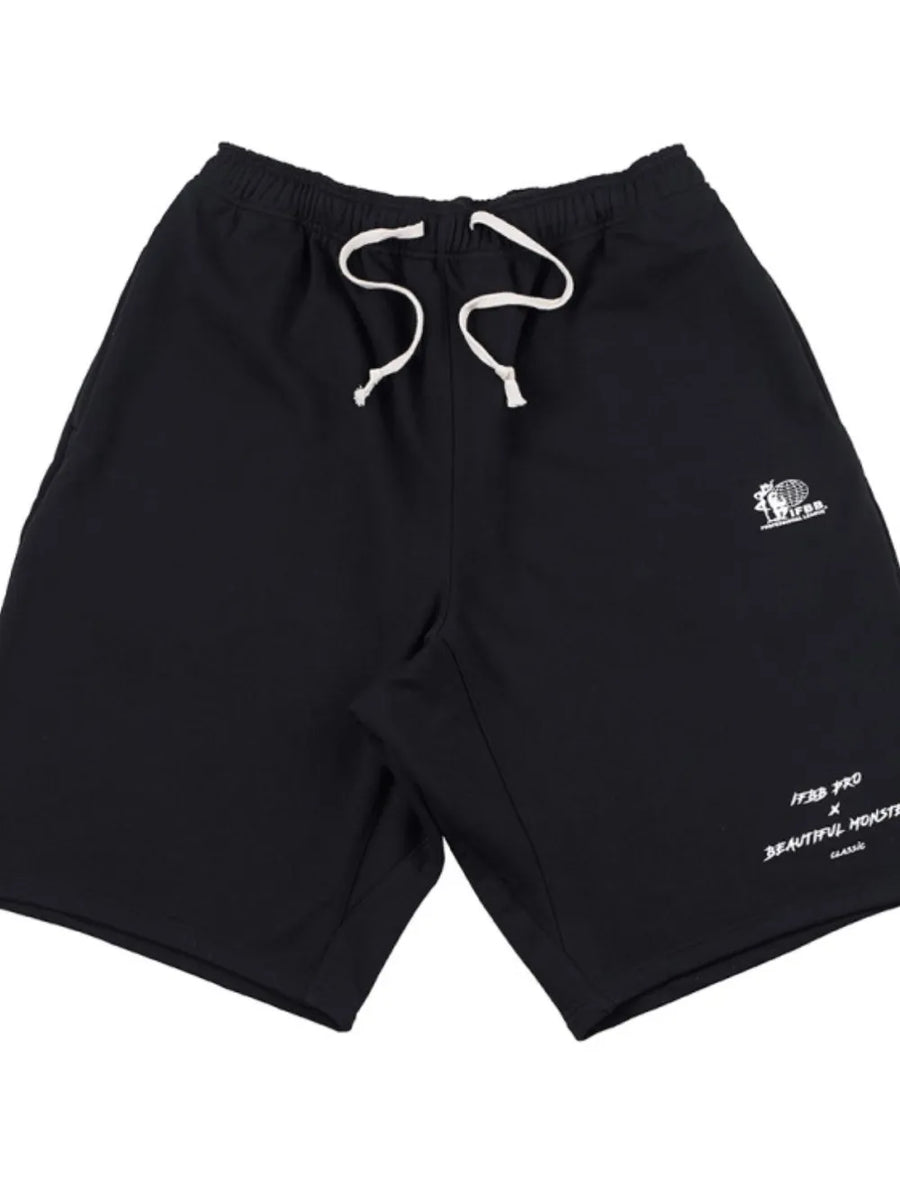 Black performance fleece jogger shorts with white drawstring and graphic details.