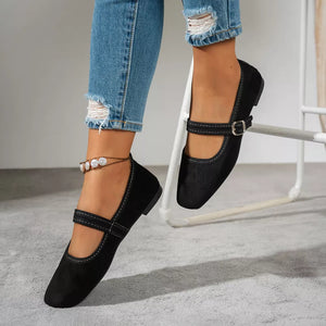 Black flats with full-length and buckle