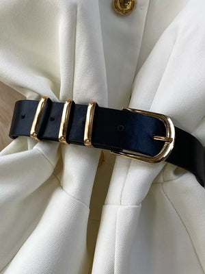 White belted two-piece set with gold buckle detail and pockets