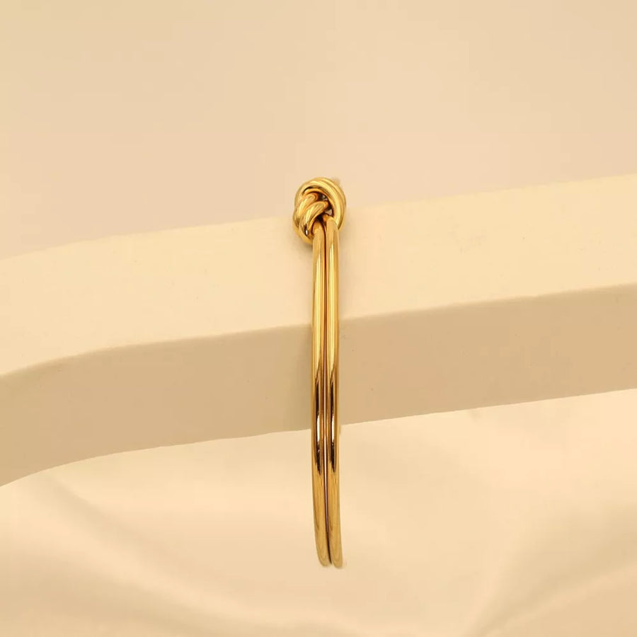 Gold with bracelet with knot detail 8