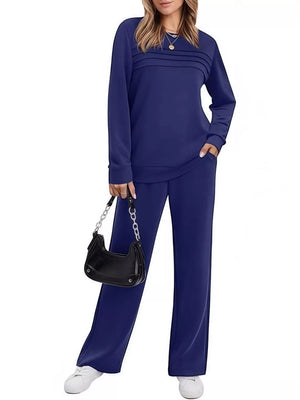 Casual long-sleeve top and pants set in dark blue with pleated detail on top and drawstring waist.