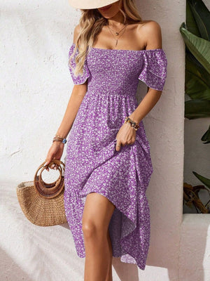 Purple floral smocked off-the-shoulder midi dress with ruffle sleeves and a tiered hem.