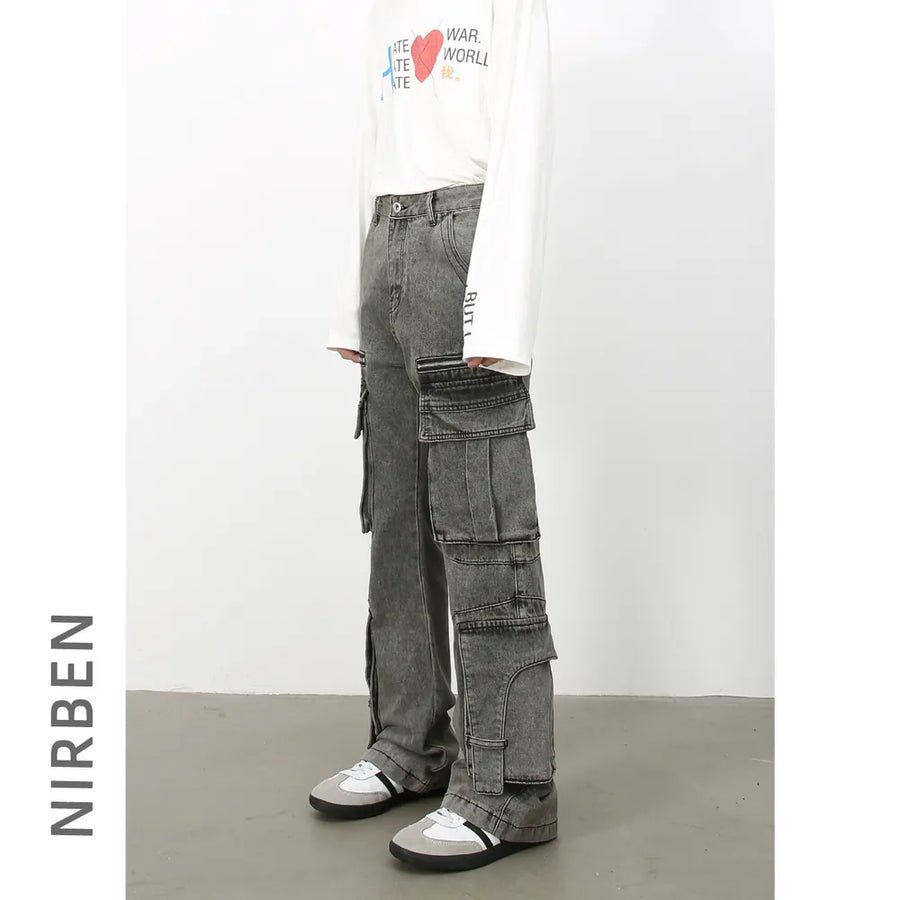 Acid wash flared cargo jeans in medium, featuring multiple pockets and a relaxed fit.