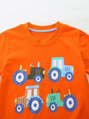 Orange cotton t-shirt with a playful tractor print for boys.