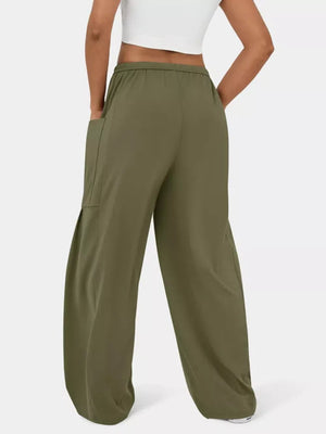 Army green maternity pants with wide legs and cargo pockets.