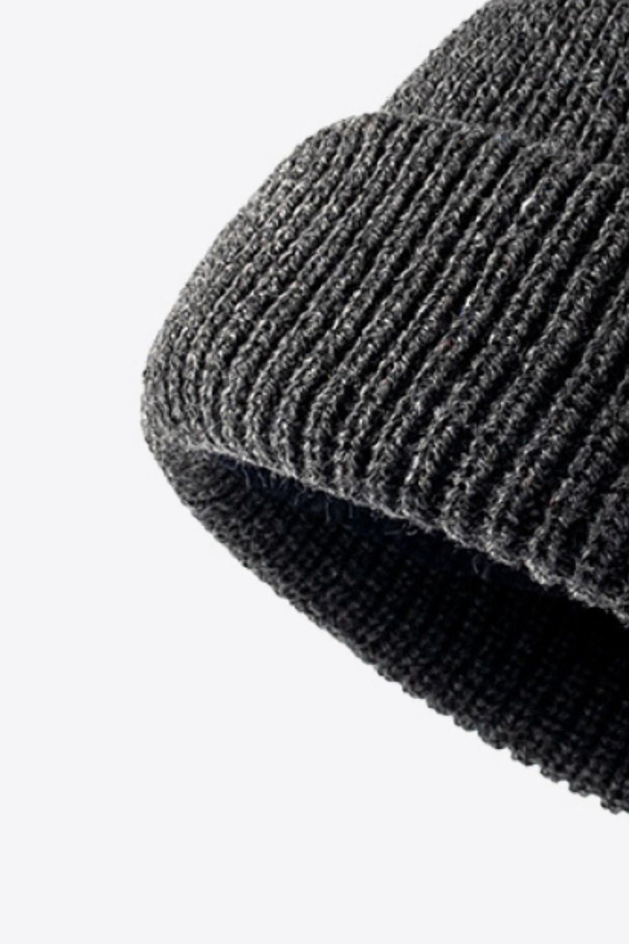 Folded edge ribbed knit beanie in dark gray acrylic.