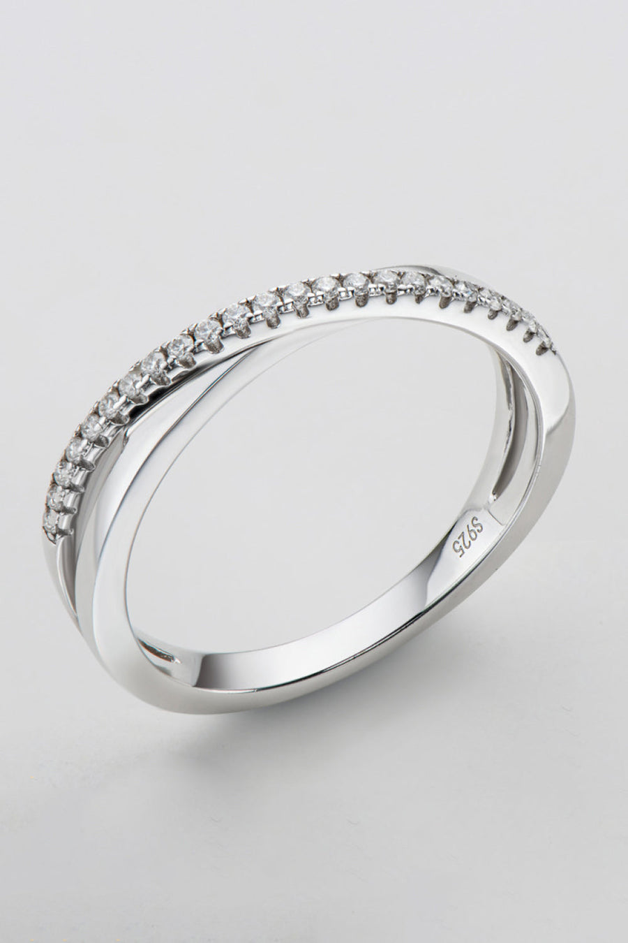 Sterling silver crossover band ring with pavé moissanite accents