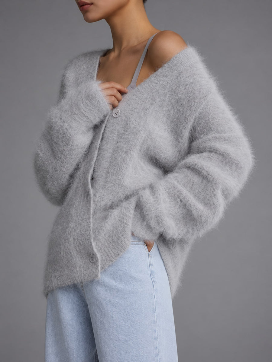 cardigan in light grey featuring buttoned and oversized fit