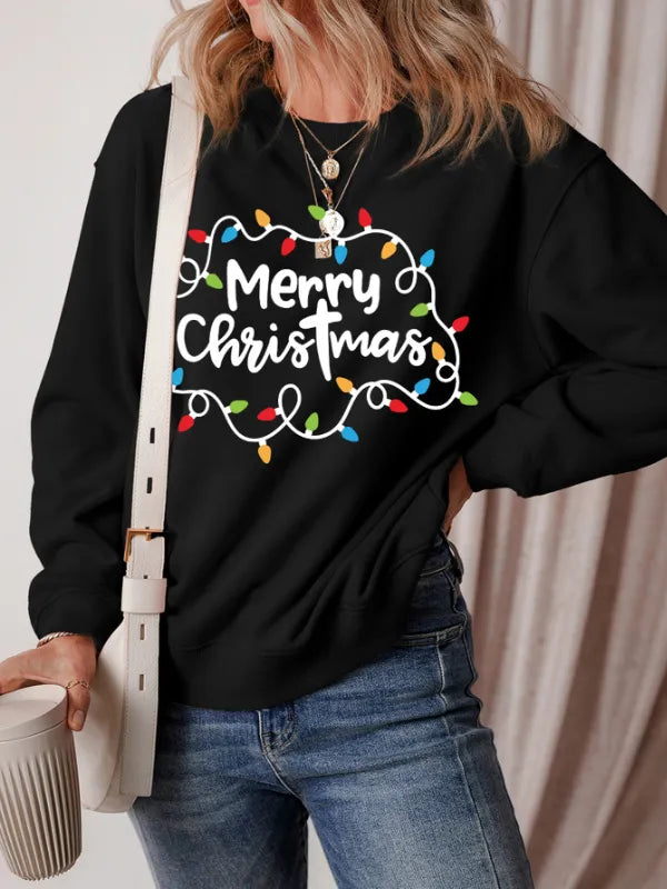 Black crewneck sweatshirt with Merry Christmas graphic and colorful string lights pattern