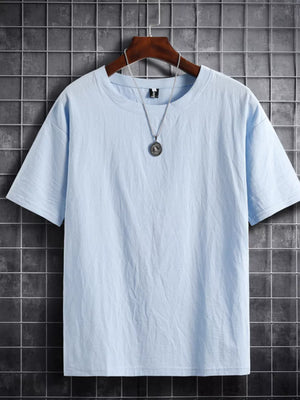 Light blue cotton crew neck t-shirt with short sleeves and a relaxed fit.