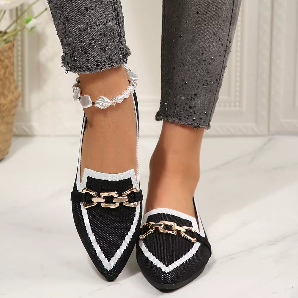 white slip-on shoes featuring pointed toe and color-block
