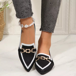 white slip-on shoes featuring pointed toe and color-block