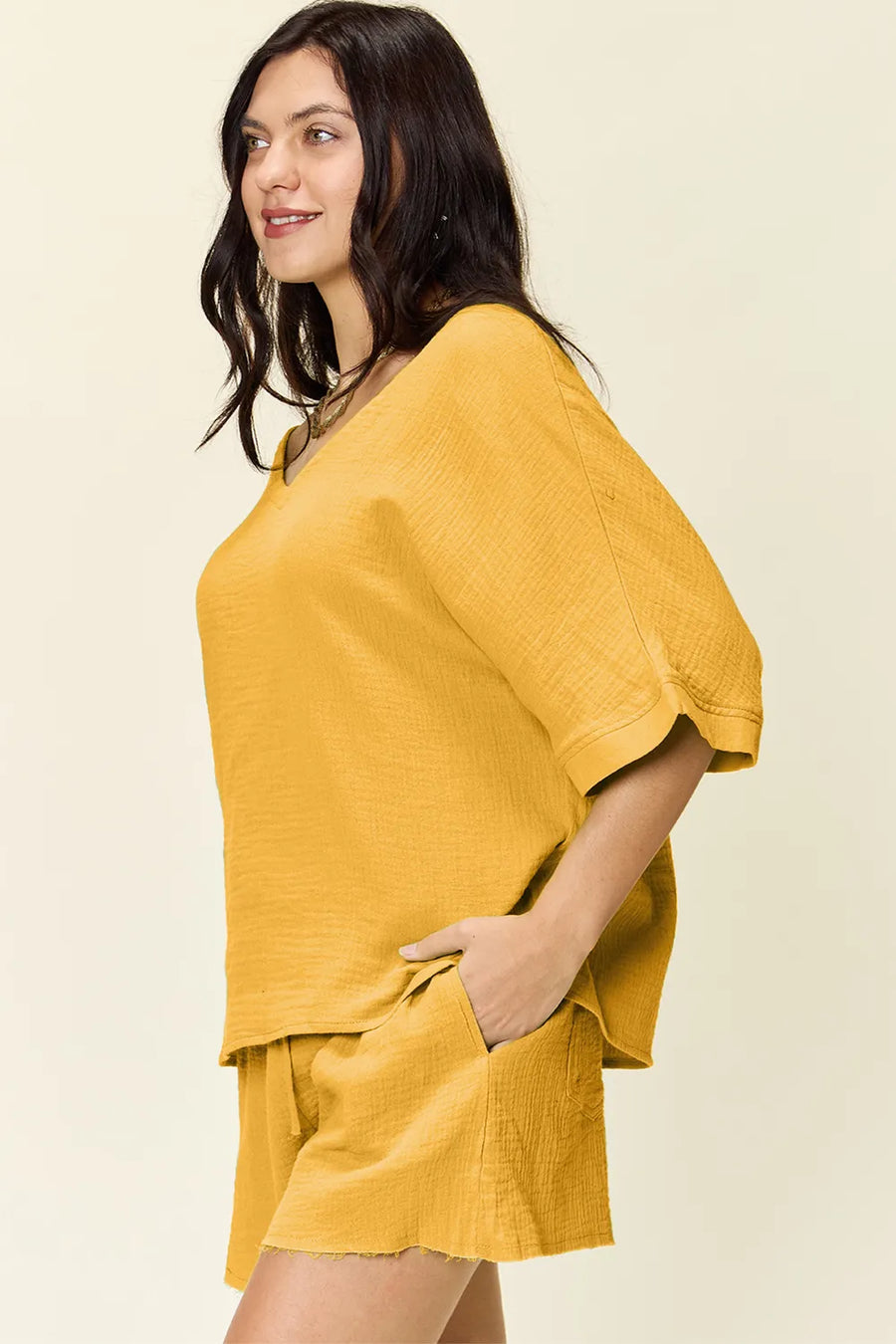 Gold textured cotton half sleeve top and drawstring shorts set
