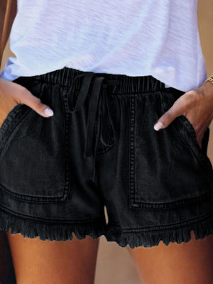 denim shorts in Red with raw hem and mini