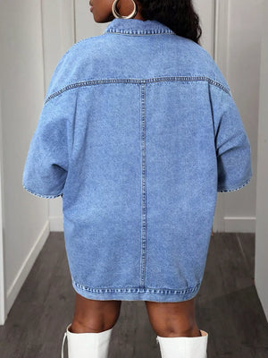 Sky blue oversized denim batwing dress with buttoned collar and short sleeves.