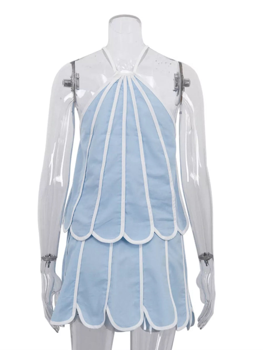 Light blue halter top with white trim and scalloped hem
