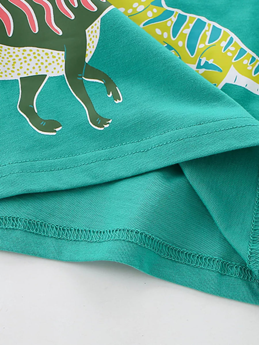 Green cotton t-shirt with dinosaur print and crew neck.