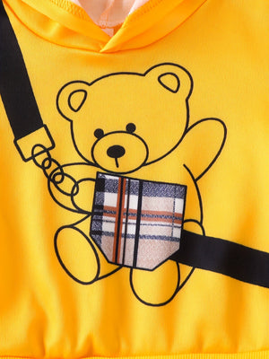Yellow baby hoodie with a cute bear graphic and plaid pocket detail.