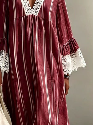 Tan midi dress featuring lace trim and striped