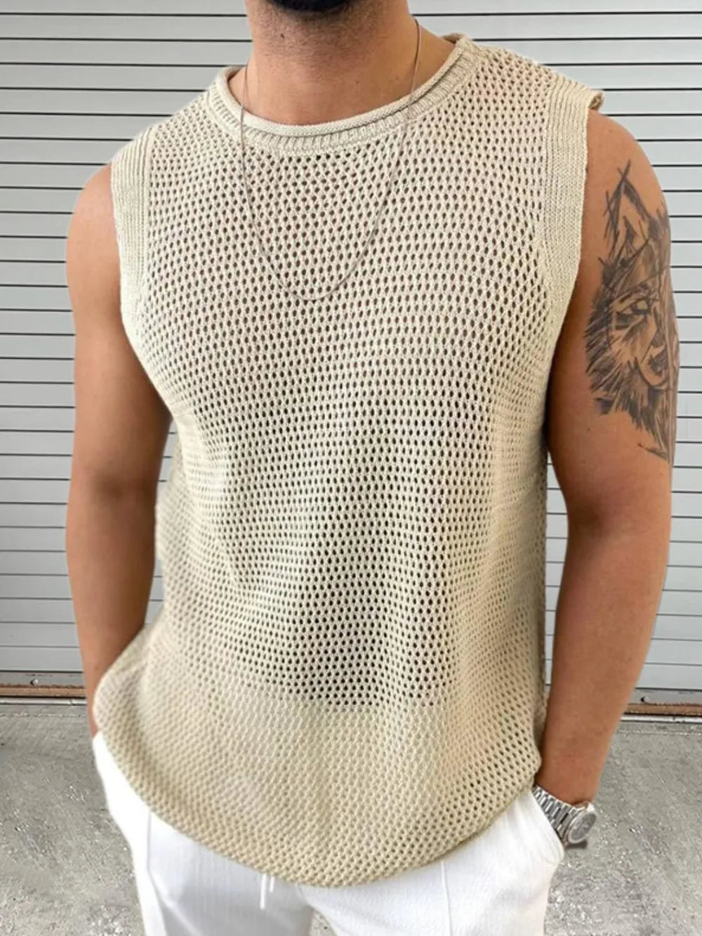 Khaki open-knit sleeveless crewneck tank top with a relaxed fit.