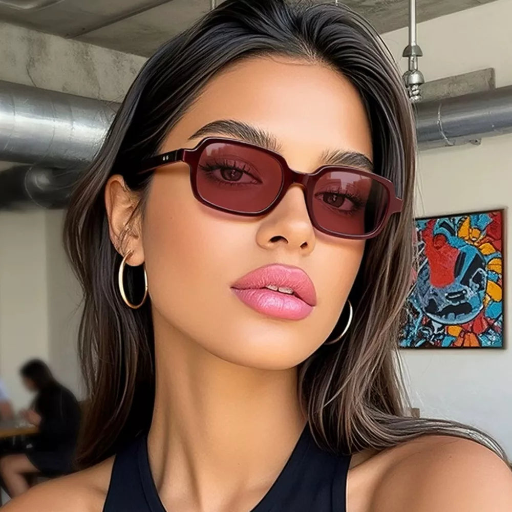 sunglasses in burgundy featuring UV protection and rectangular fit