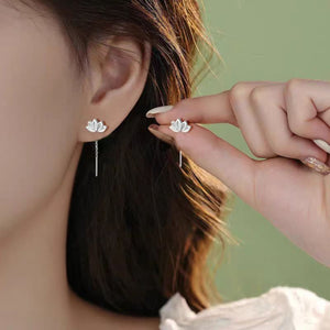 earrings in silver featuring dangle and jewelry fit