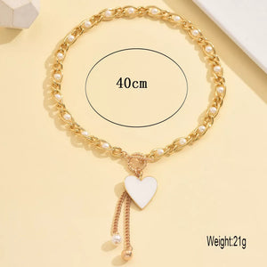 necklace in ivory with heart pendant and choker length
