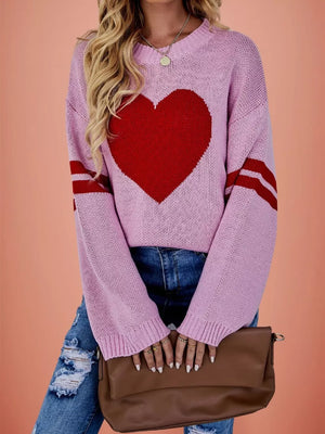 light pink pullover sweater with heart-print and crew neck