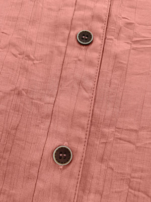 100% polyester Care instructions: Machine wash cold button-down shirt in coral pink with relaxed silhouette