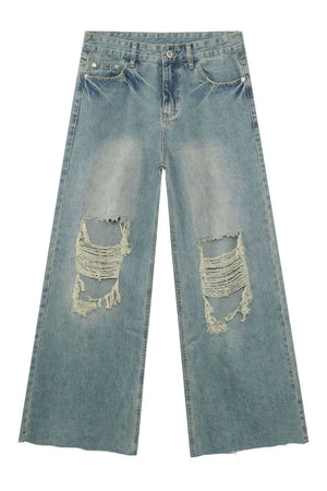 Distressed wide-leg jeans in medium wash denim with frayed rips on the knees.