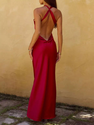 Satin maxi dress in red with a deep V-back and crisscross halter straps.