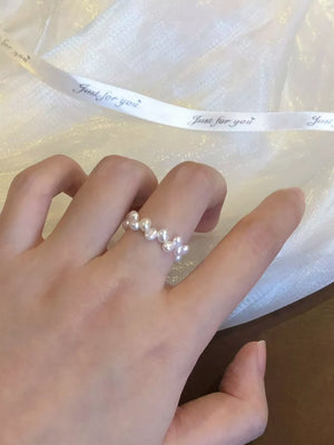 ring in ivory featuring beaded and fitted fit