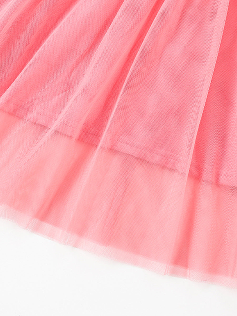 Pink toddler tulle dress with layered ruffles and subtle sequin flower detail.