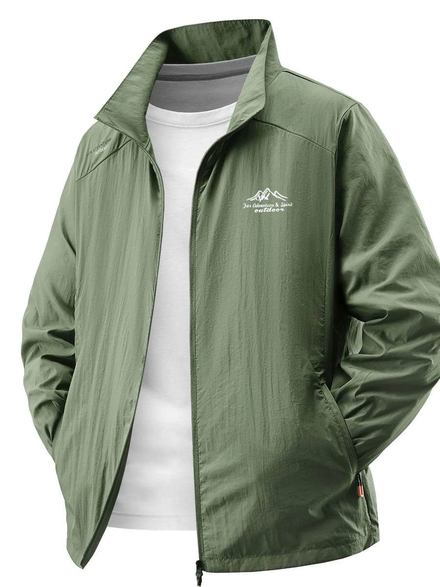 Military green lightweight windbreaker jacket with embroidered mountain logo and zip closure.