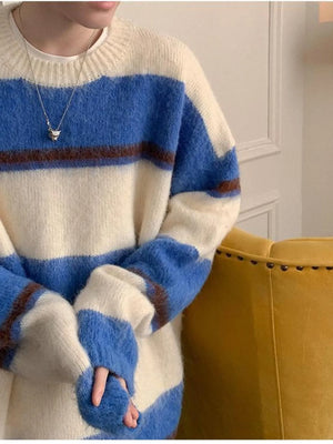 Blue striped fuzzy knit pullover sweater with crew neck and long sleeves.