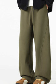 Relaxed wide-leg army green men's sweatpants with drawstring and seam detail