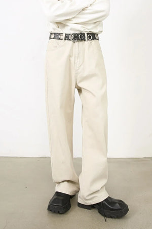 Oversized beige denim jeans with a sculpted leg and neutral wash