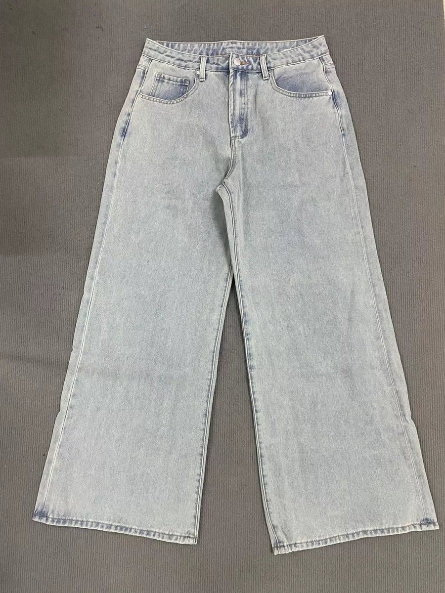 Light wash denim high-waisted relaxed fit jeans with button fly and wide leg.