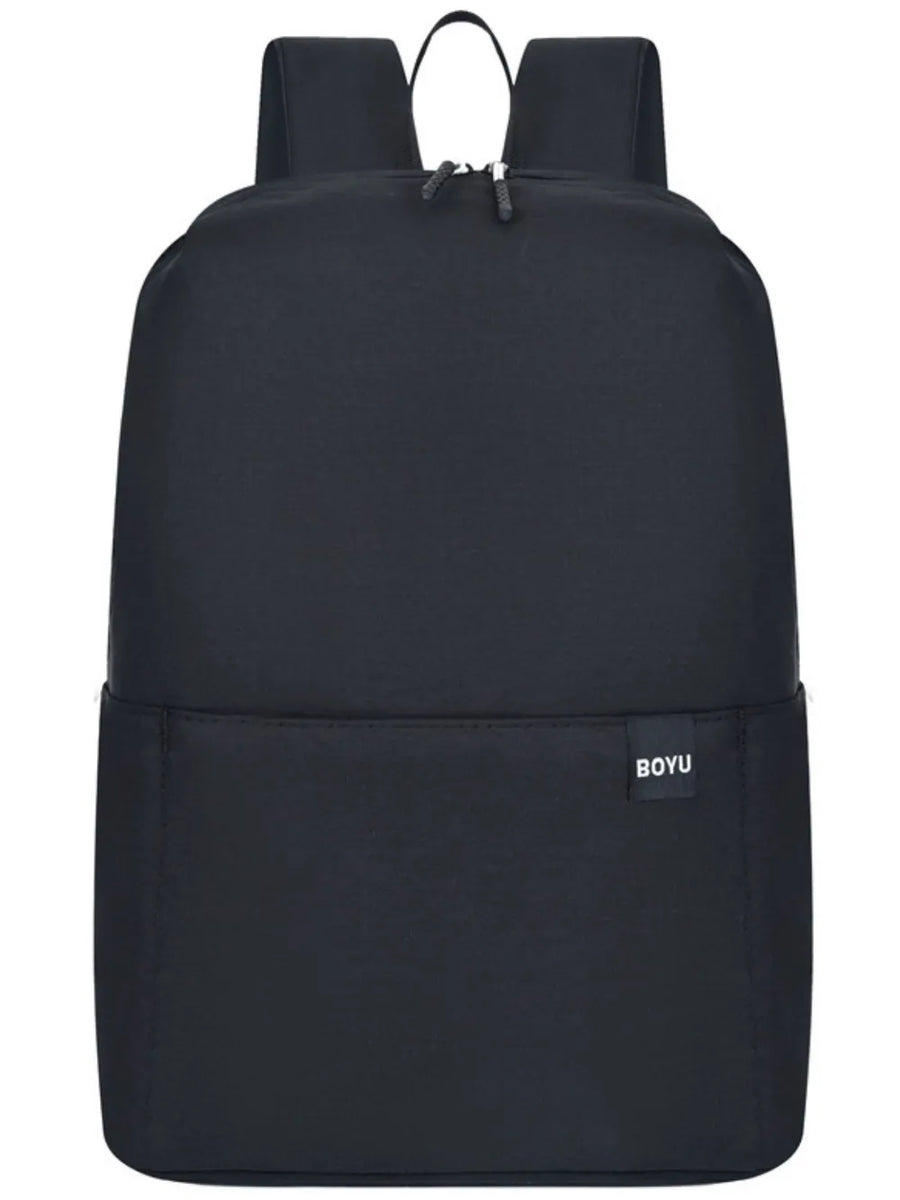 Black textured backpack with minimalist design and front pocket detail.