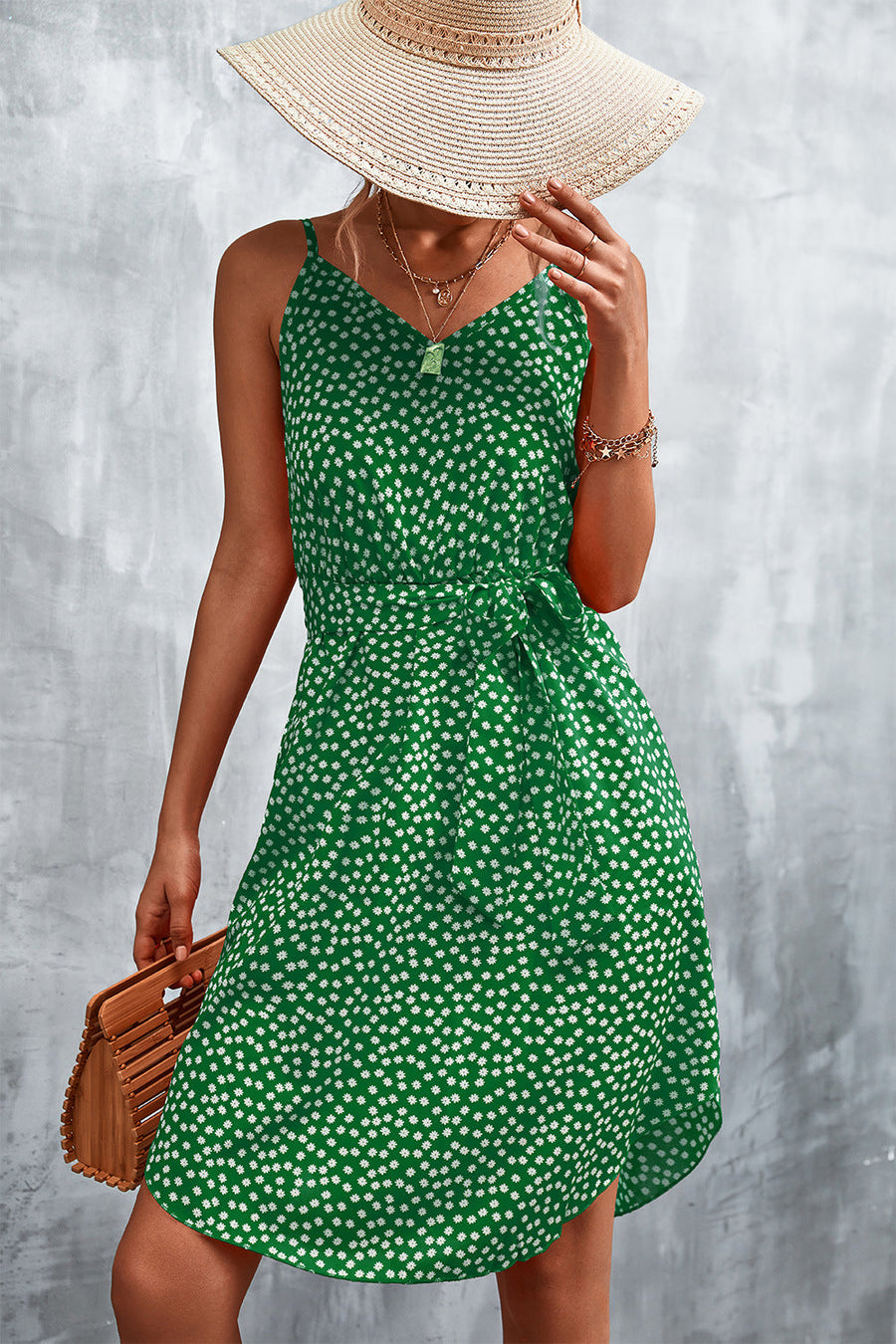 Green daisy print slip dress with tie waist and V-neck