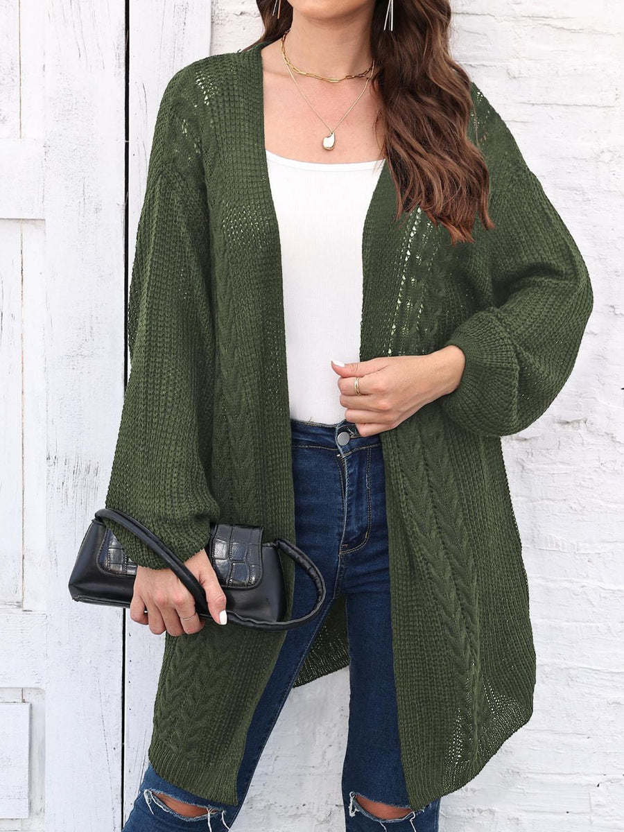 Army green cable knit cocoon cardigan with open front and balloon sleeves.