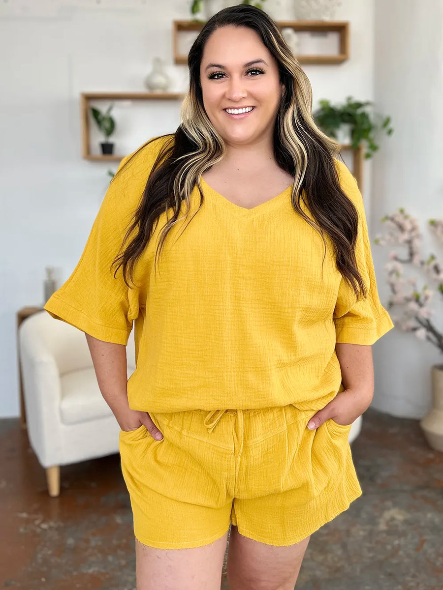 Gold textured cotton half sleeve top and drawstring shorts set with v-neck.