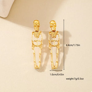 earrings in Gold with skeleton and dangle