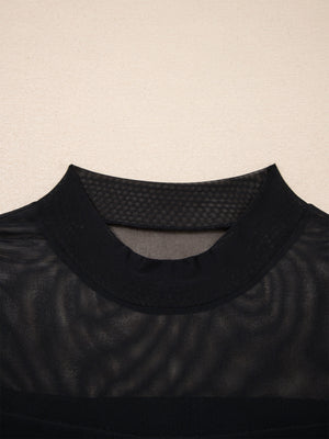 Black sheer mesh t-shirt with mock neck and cap sleeves.